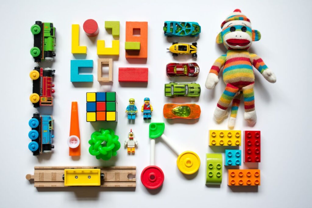 An array of multicolored toys and learning aids commonly found in daycare centers. Photo by Vanessa Bucceri on Unsplash.