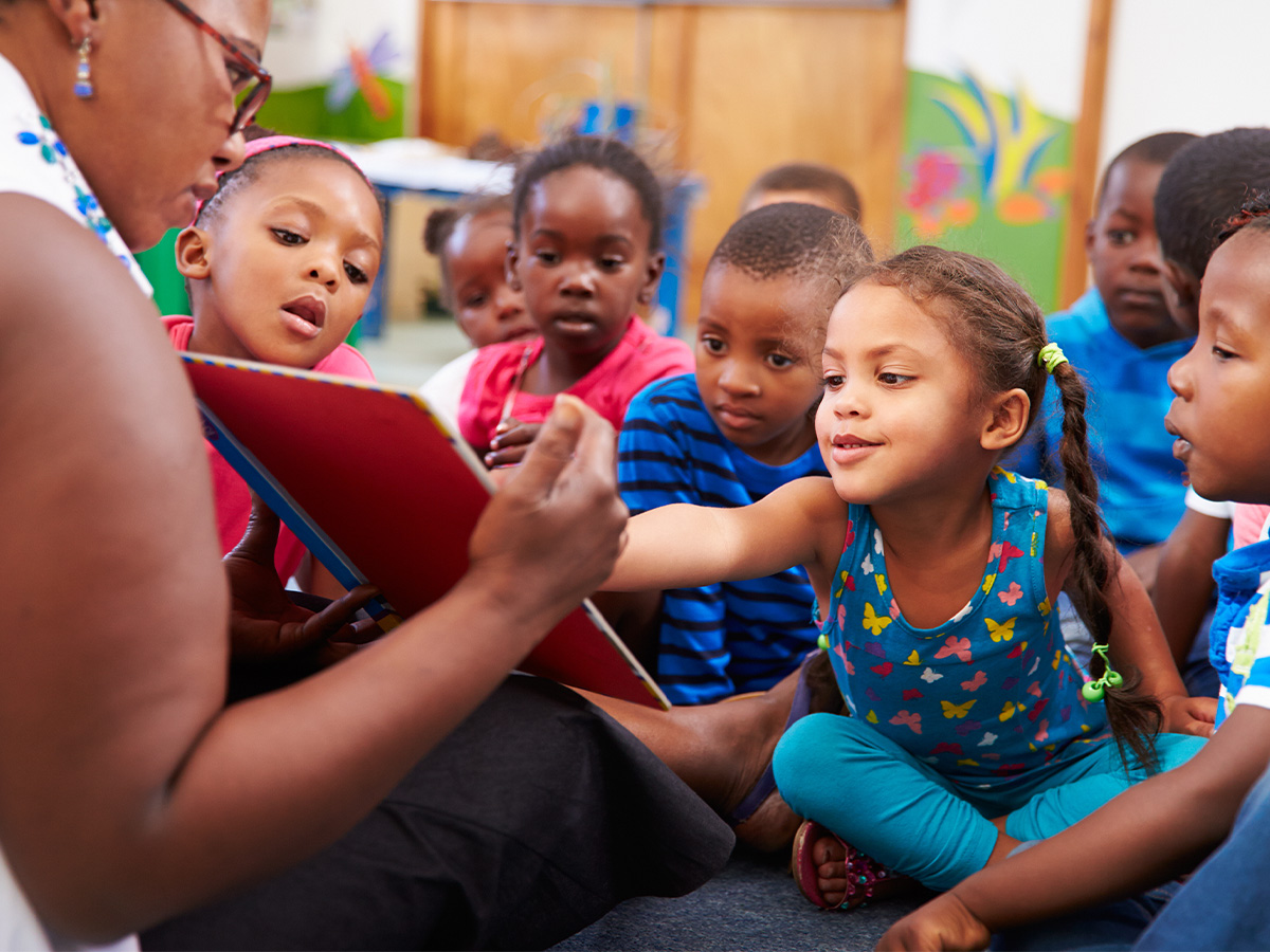 students learning with teacher