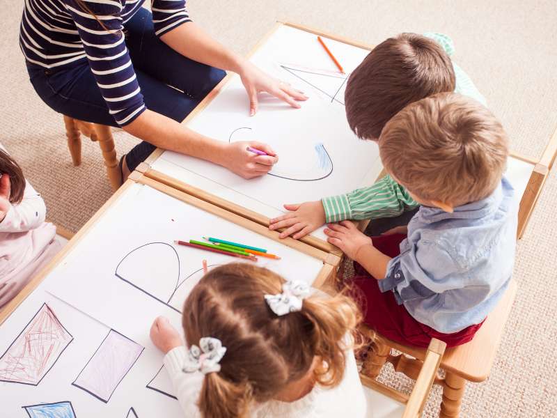 kids learning letters in daycare