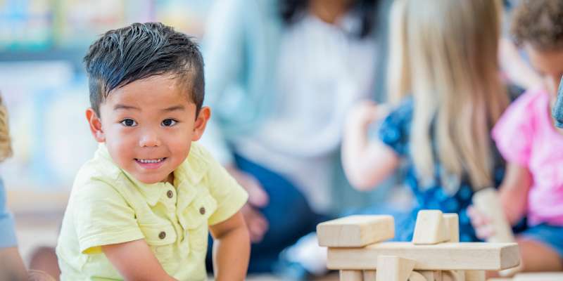 smiling boy in daycare