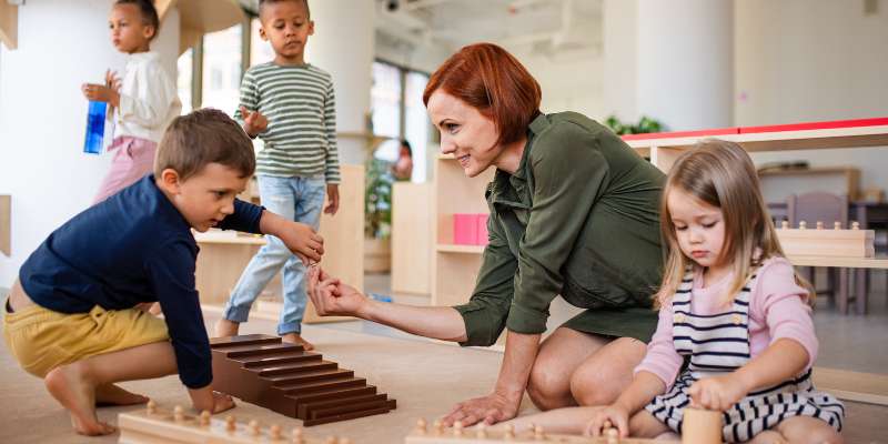 daycare teacher teaching kids