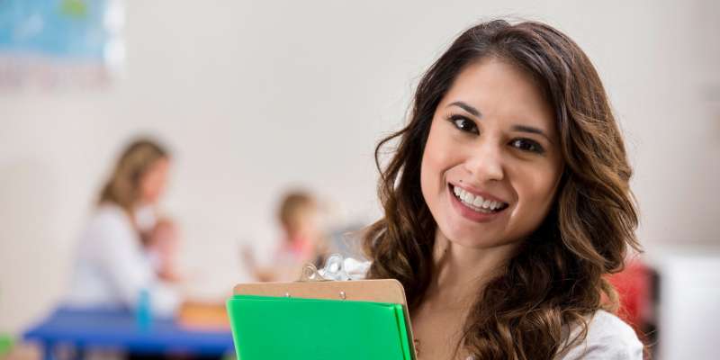 smiling daycare teacher