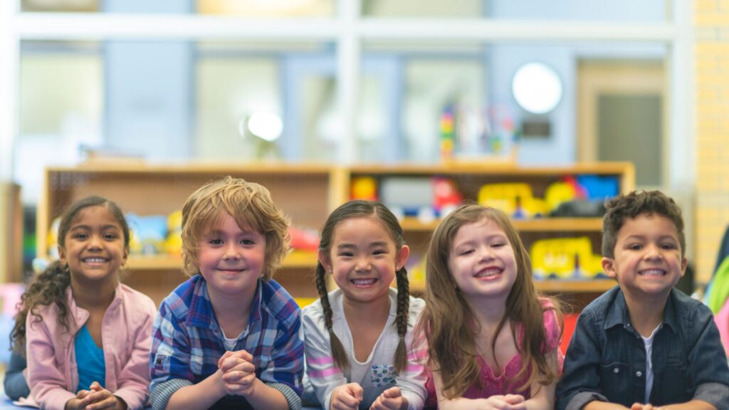 a group of kids smiling