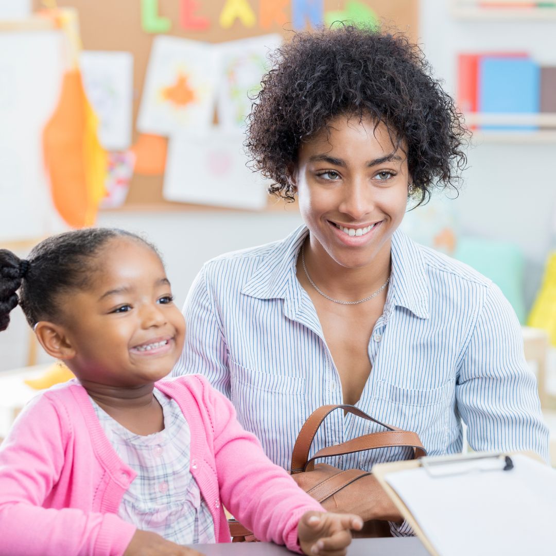 a mom talking with her daughters teacher