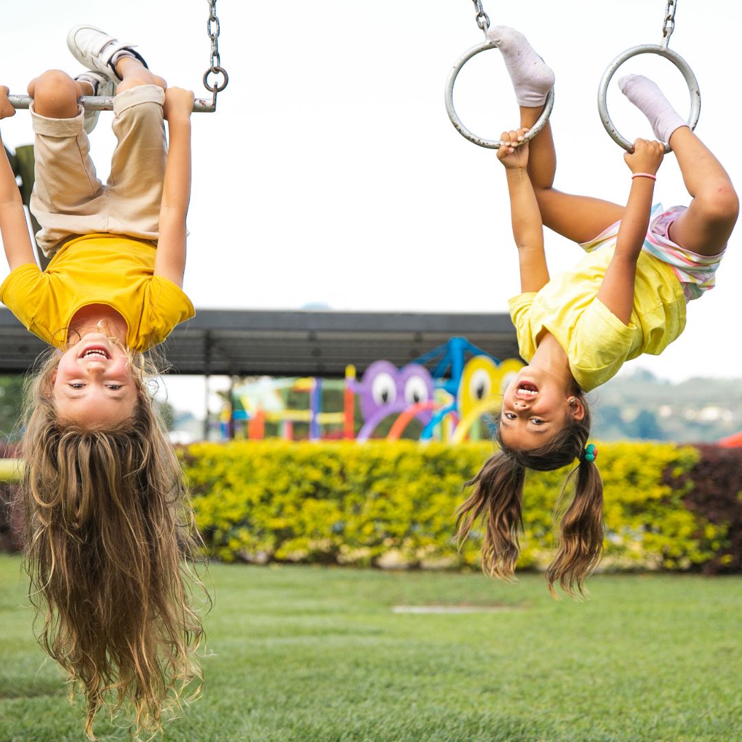 kids hanging upside down