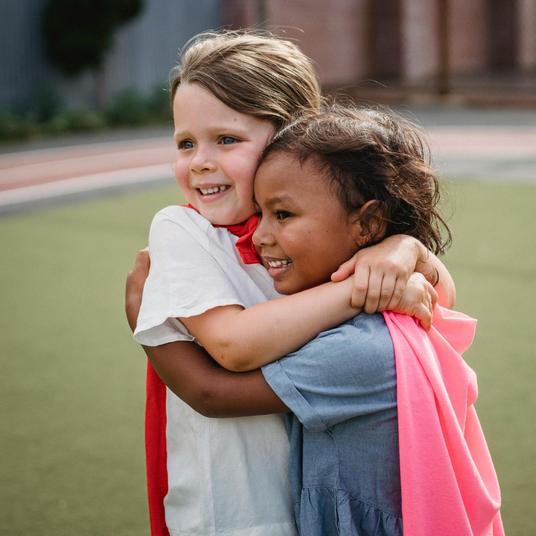 two girls hugging