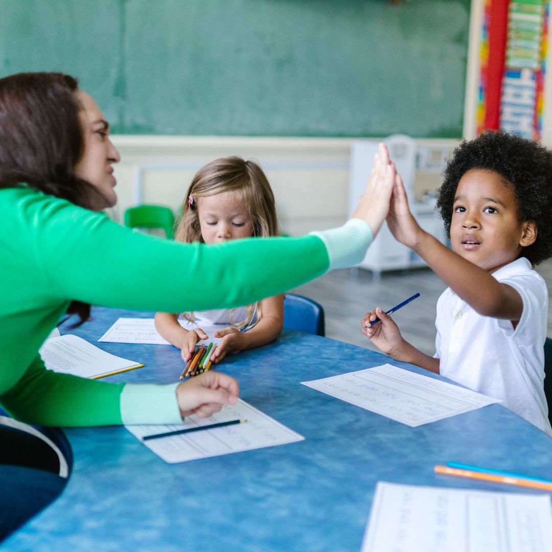 children with daycare teacher