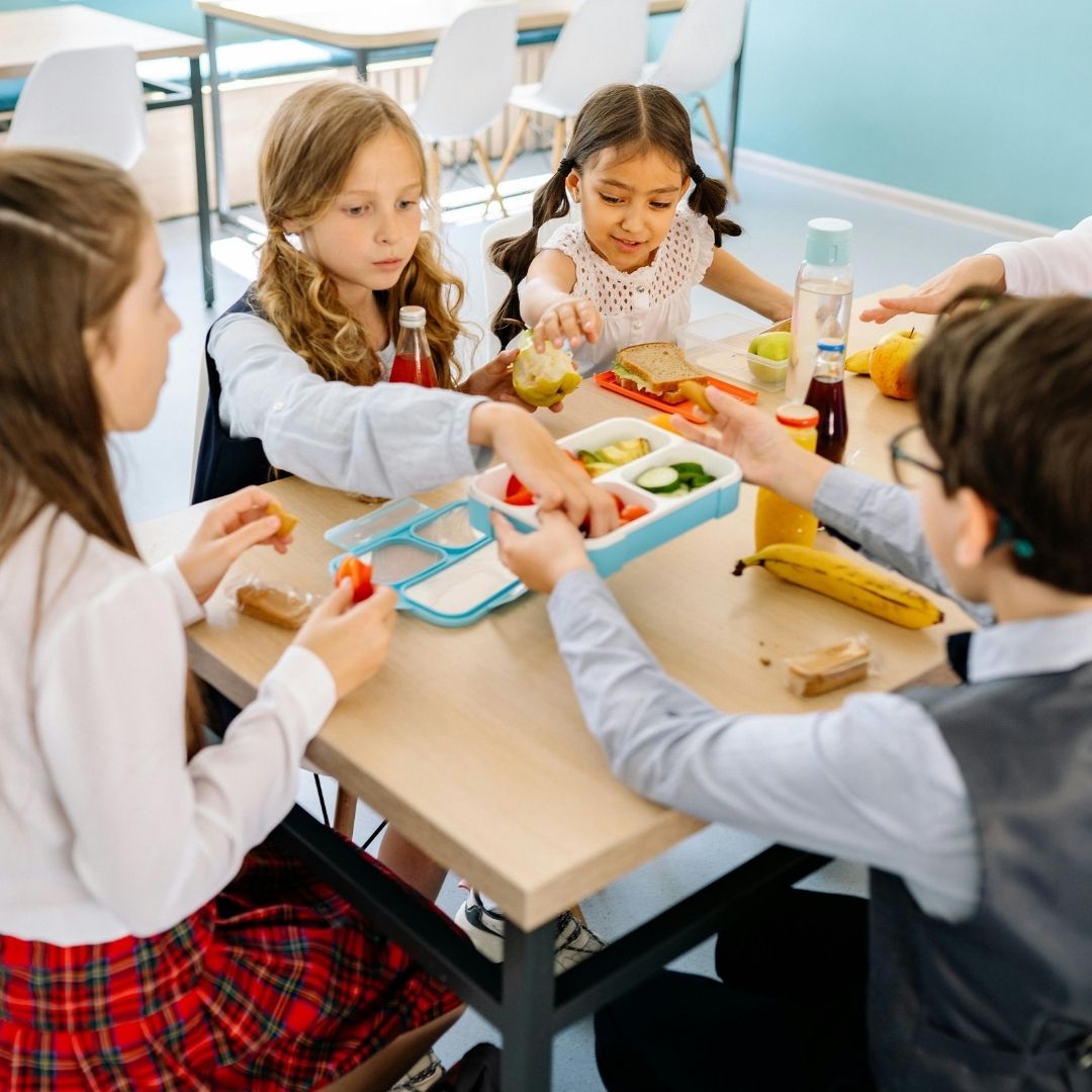 school age kids eating together