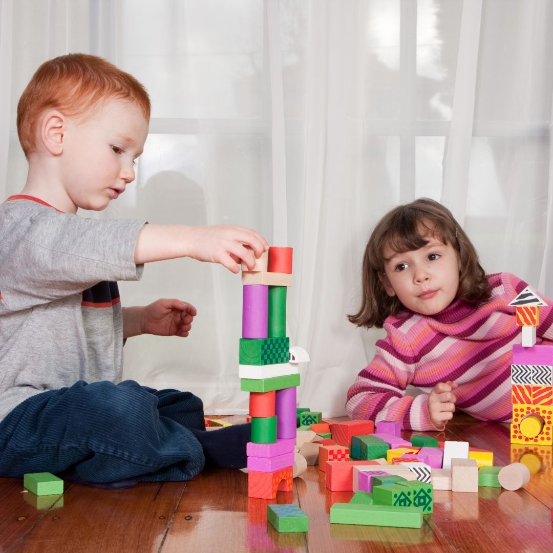 Two toddlers playing.