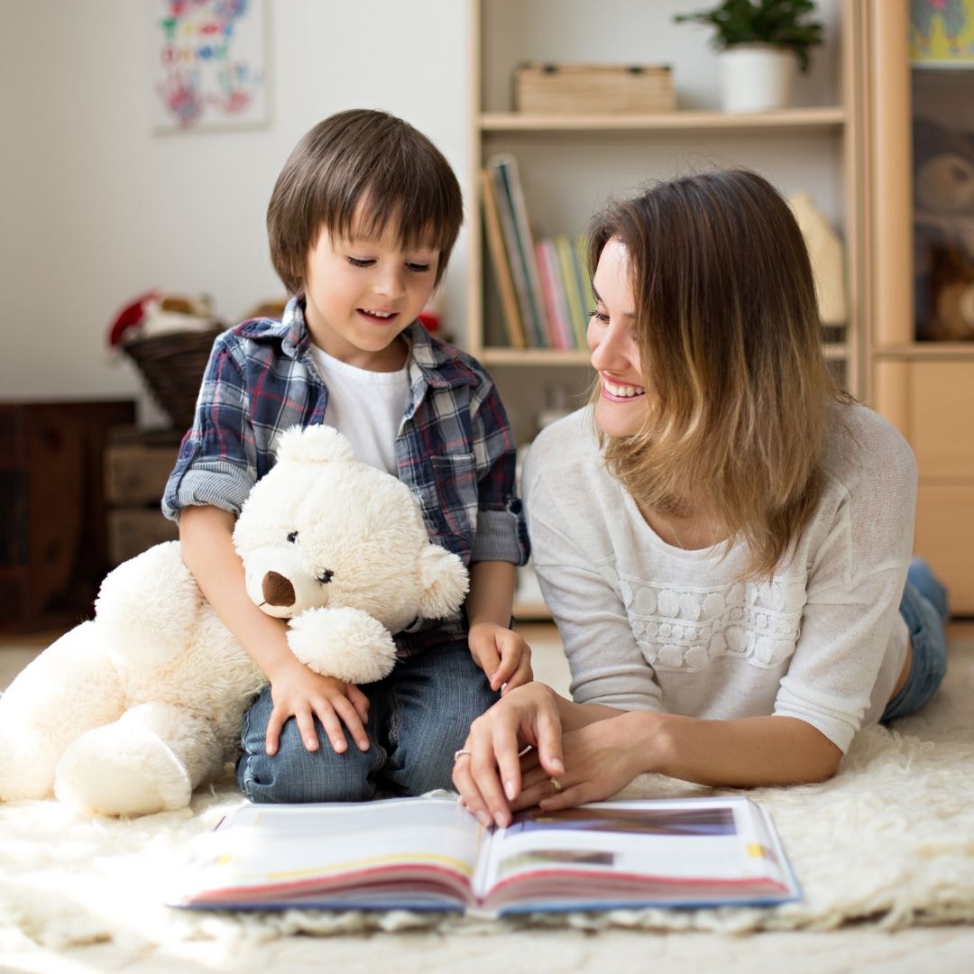 A mother reading to her child.
