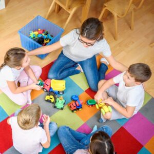 Toddlers playing with educational toys